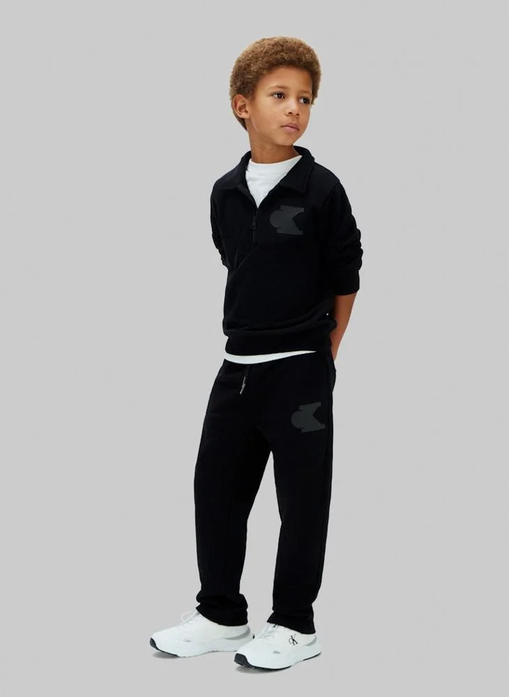 Calvin Klein Jeans BLACK [CSI] 25CW1000175CK Texured Logo Straight Leg Terry Joggers for Men | Best Price UAE