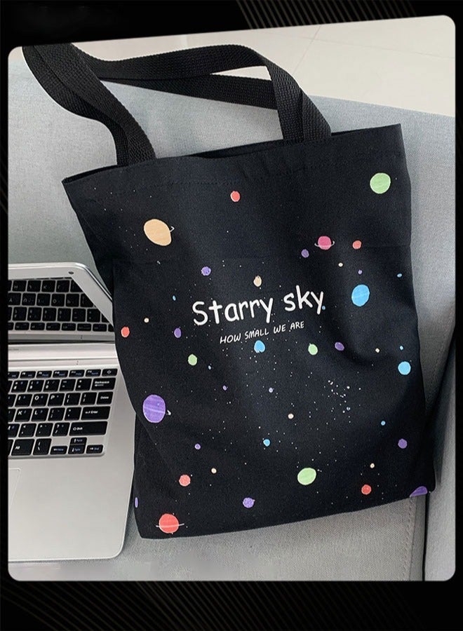 Joychic حقيبة قماش قابلة للطي بطباعة جرافيك سعة كبيرة حقيبة كتف مدرسية خفيفة الوزن حقيبة يومية سوداء - Image 4