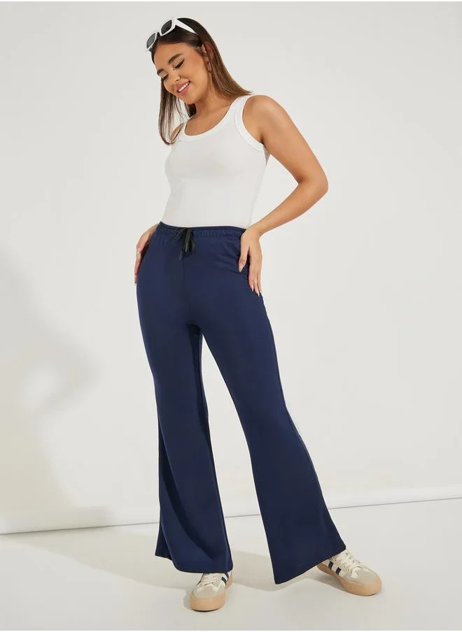 Styli Solid Flared Joggers with Drawstrings