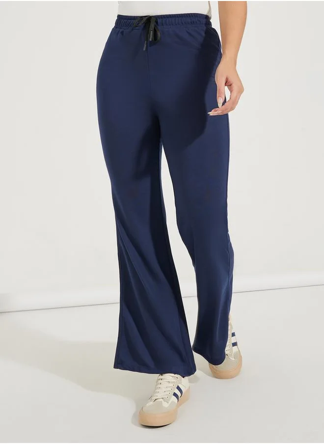 Styli Solid Flared Joggers with Drawstrings
