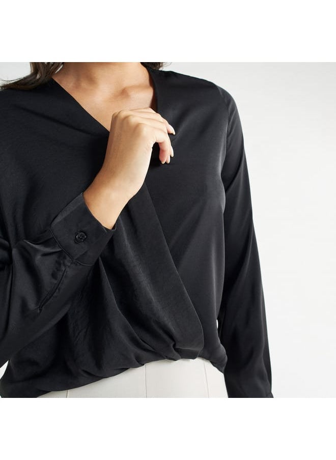 FAV - Solid V-neck Top with Long Sleeves and High Low Hem - Image 1