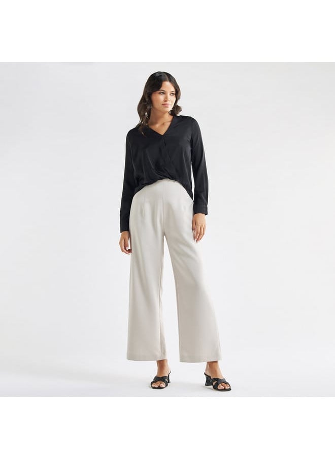 FAV - Solid V-neck Top with Long Sleeves and High Low Hem - Image 1