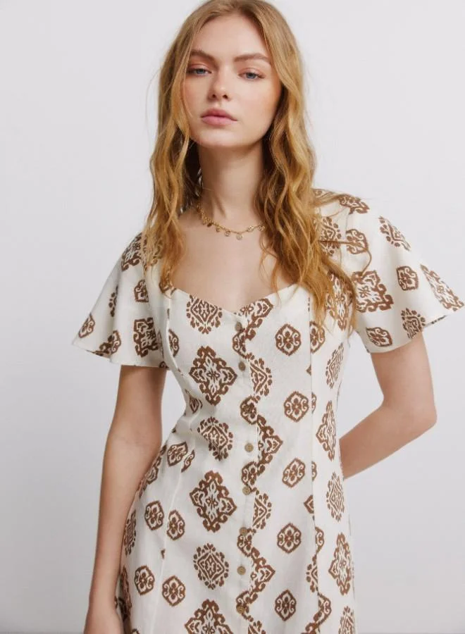 Springfield  Printed semi-fitted short sleeve shirt collar V-neck front button flared midi dress for Women | Best Price UAE
