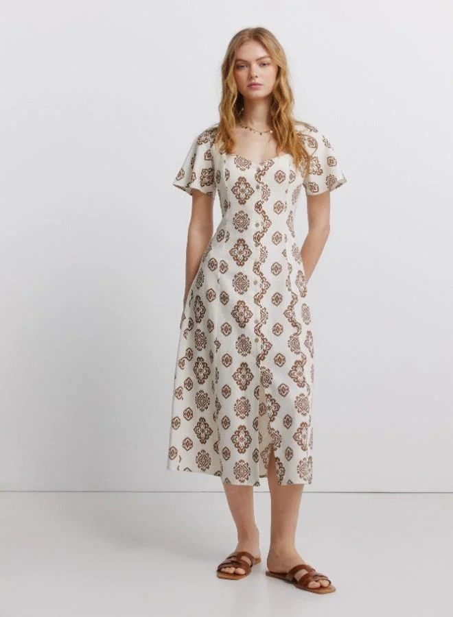 Printed semi-fitted short sleeve shirt collar V-neck front button flared midi dress