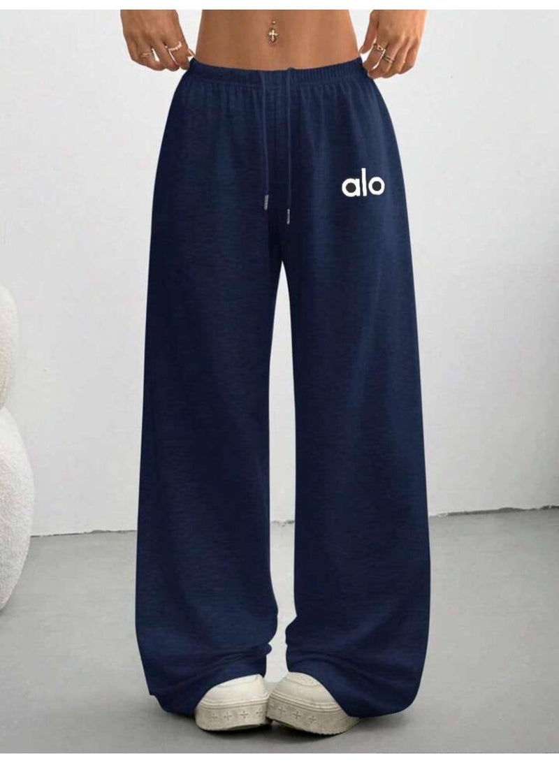 Wide-leg alo with a distinctive design, made of cotton inside and a soft texture on the outside, comfortable wide legs, with a drawstring waist, color navy blue.