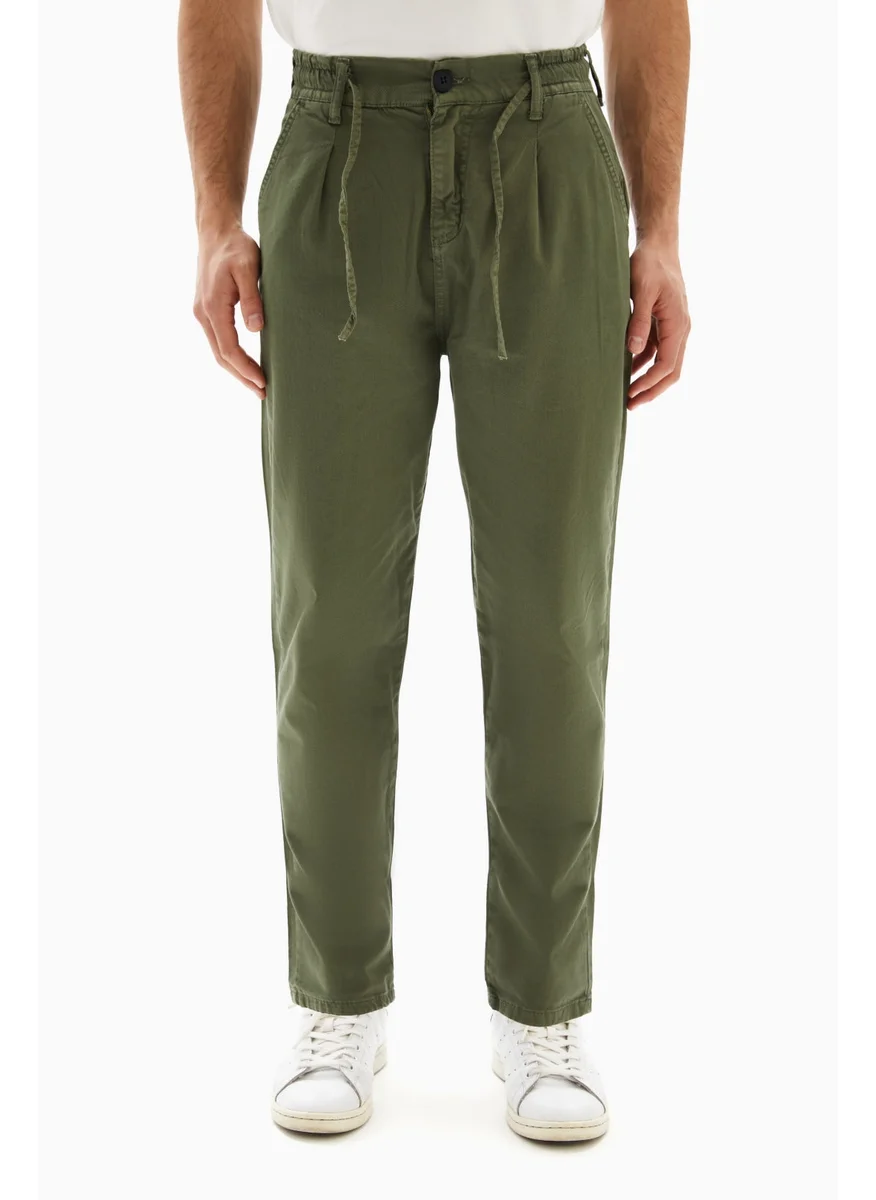 Wecre8 Khaki Green Drawstrings Slim Trousers By WECRE8