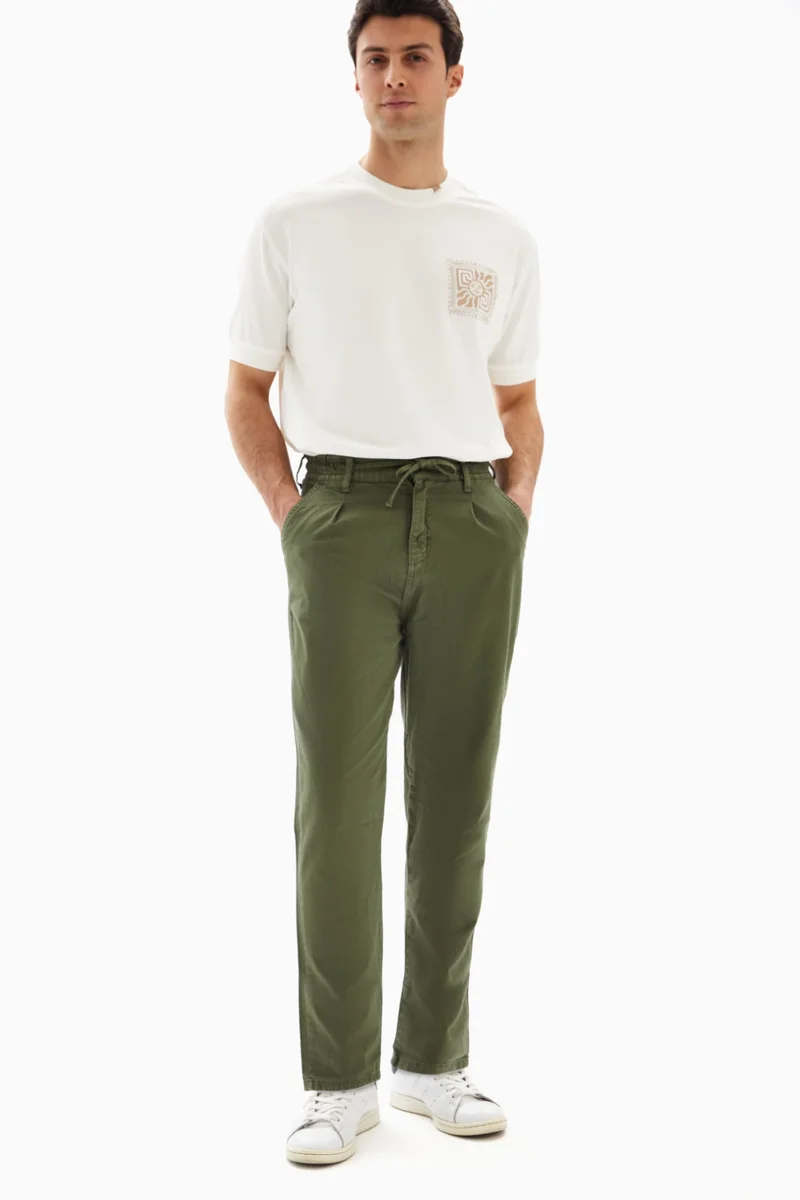 Wecre8 Khaki Green Drawstrings Slim Trousers By WECRE8