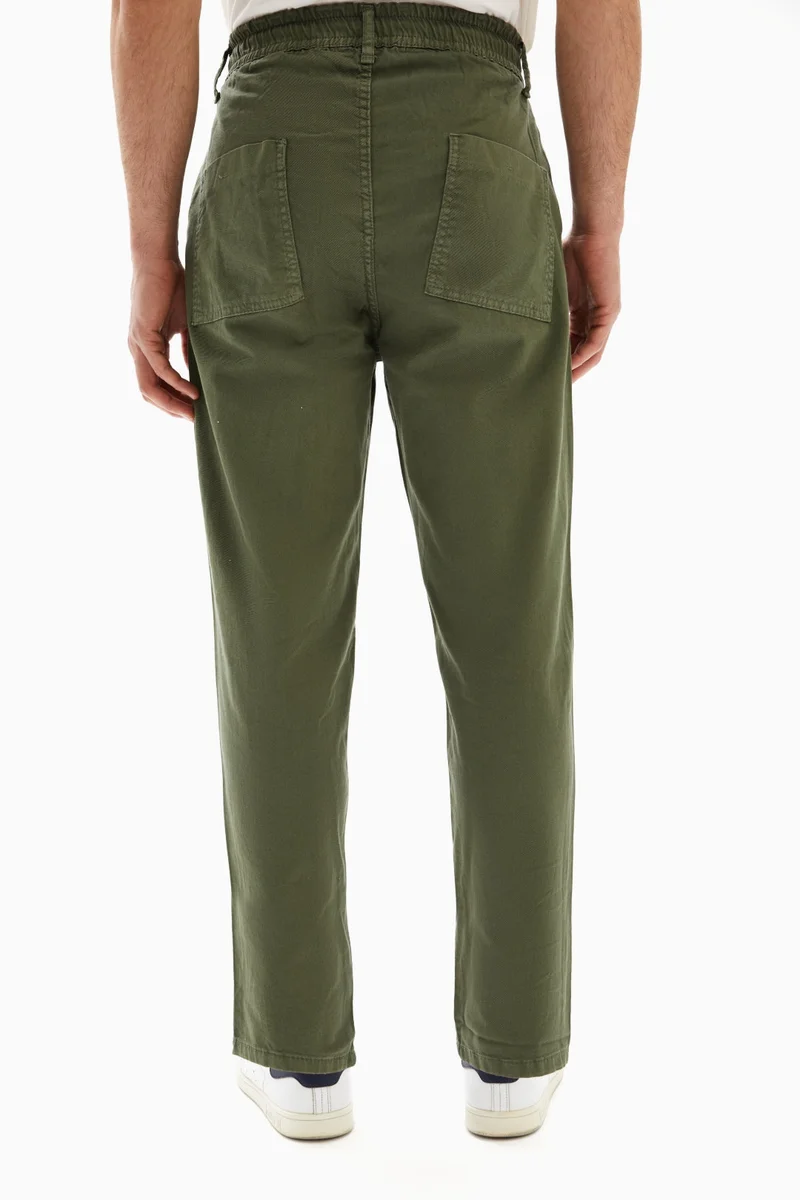 Wecre8 Khaki Green Drawstrings Slim Trousers By WECRE8