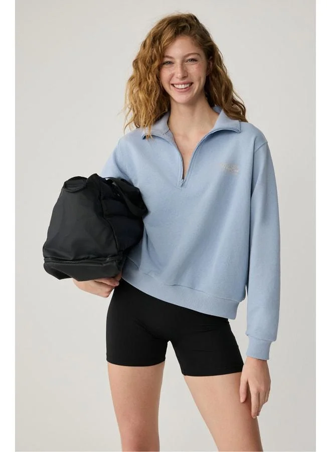 Urban Beat  ARUNA Urbanbeat Women's Relaxed Light Blue Zippered High-Collar Sweatshirt with Print Details. for Women | Best Price UAE