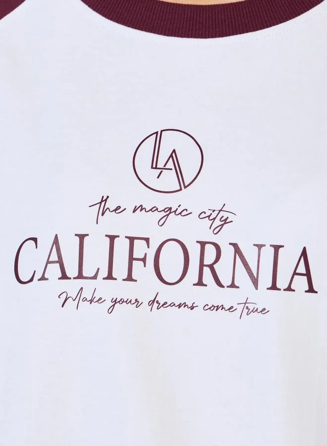 Styli Oversized Longline Slogan Print Sweatshirt