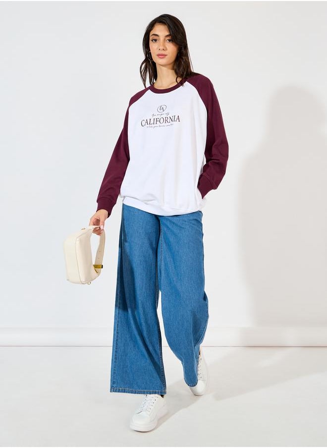 Styli - Oversized Longline Slogan Print Sweatshirt - Image 1
