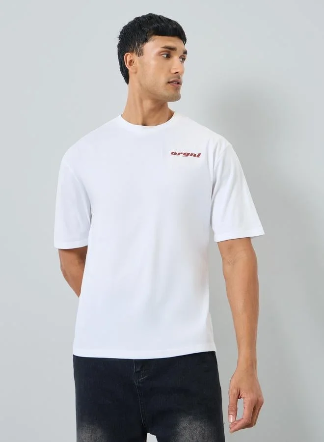 Styli Men White Graphic Print Oversized T-Shirt