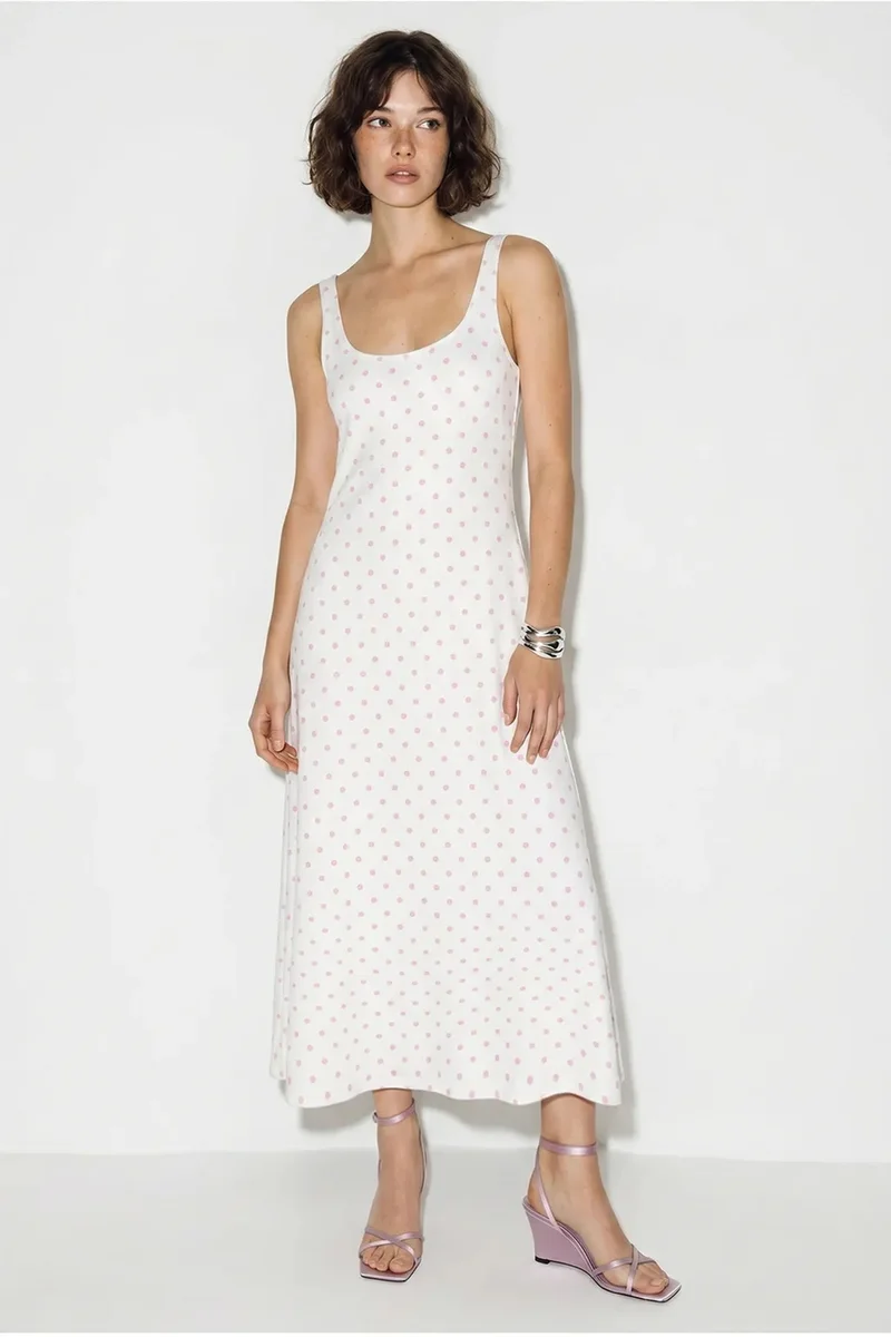 بيانكو لوتشي LUCCI Polka Dot Sleeveless Midi Dress With Tie Detail