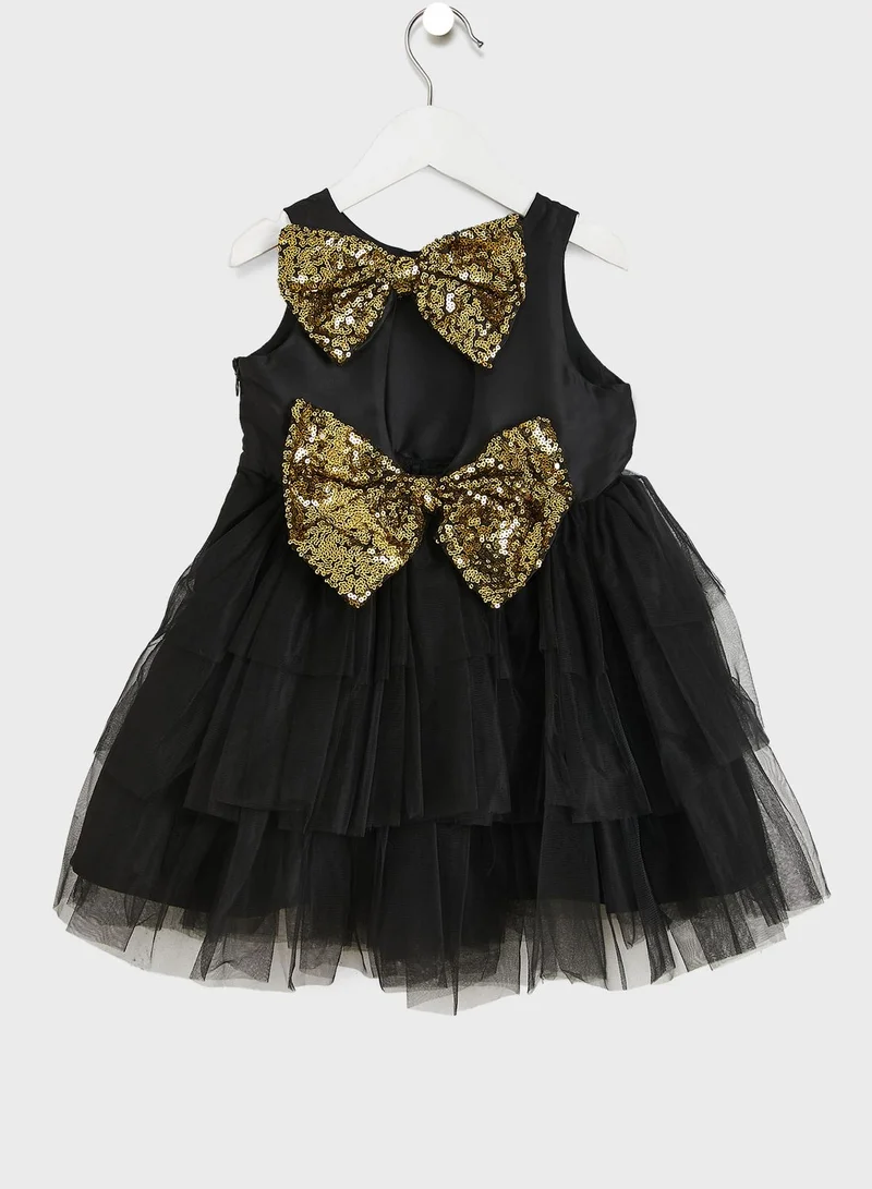 Pinata Party Wear Layered Dress With Bow Detailing On Waist