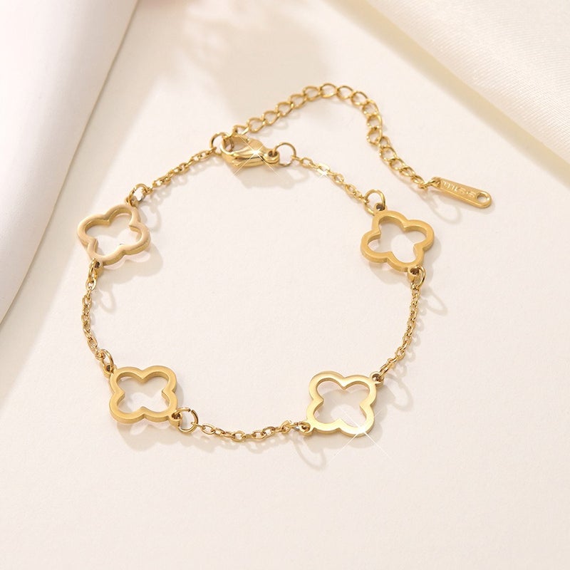 Luxury Stainless Steel Four-Leaf Clover Bracelet with 18K Gold Plating and Zirconia - Elegant, Versatile, and Trendy