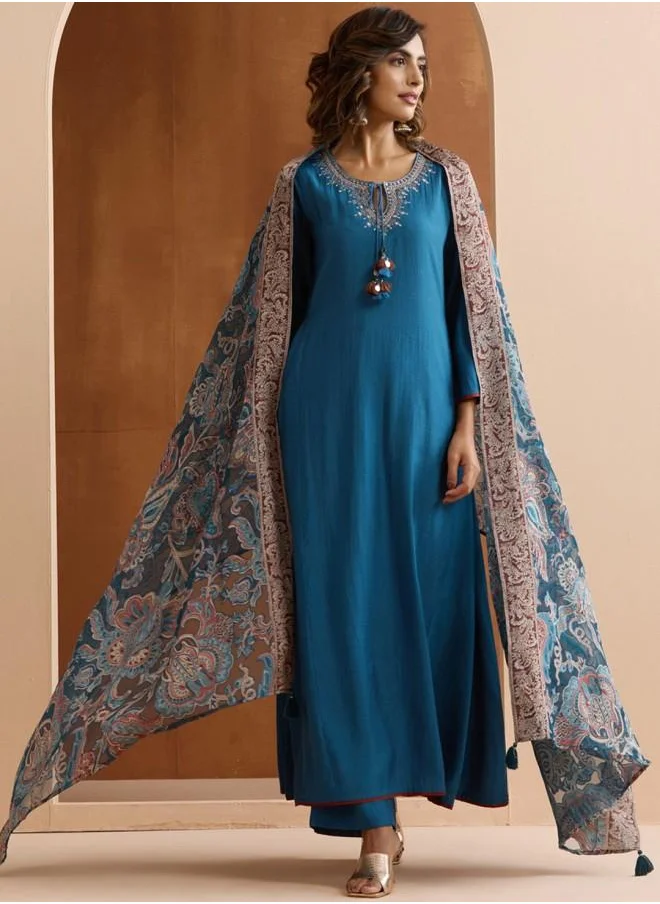 ISHIN Straight Fit Women Teal Poly silk Kurta Set with Embroidered pattern Tunic and Palazzo features a Round neckline and Three-Fourth Sleeve secured with Elastic closure and styled in Straight Fit ideal for Festive moments — crafted to elevate your special moments.
