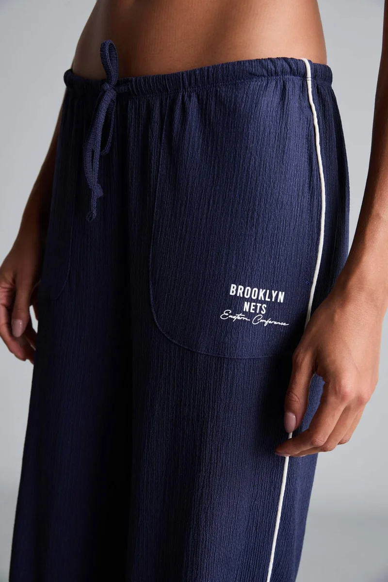 Defacto  NBA Brooklyn Nets Wide Leg Standard Length Crinkle Fabric Sweatpants  | Best Price UAE