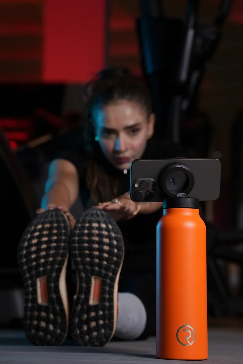 سپورتس اورجن زجاجة ماء معزولة ماج سعة 32 أونصة مع حامل هاتف، دوران 360 درجة، ساخنة لمدة 6 ساعات وباردة لمدة 12 ساعة - برتقالي