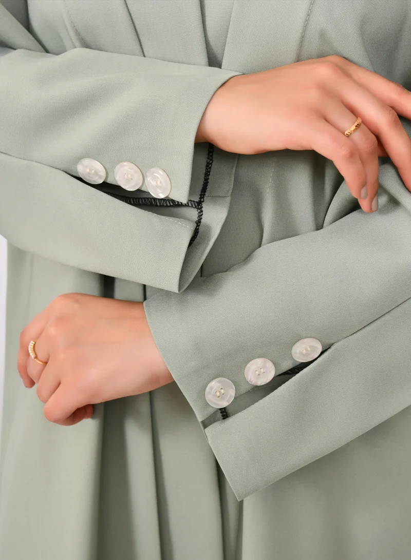 HAWRAA ABAYA Green abaya with blazer design and closed shoulders with buttons and a