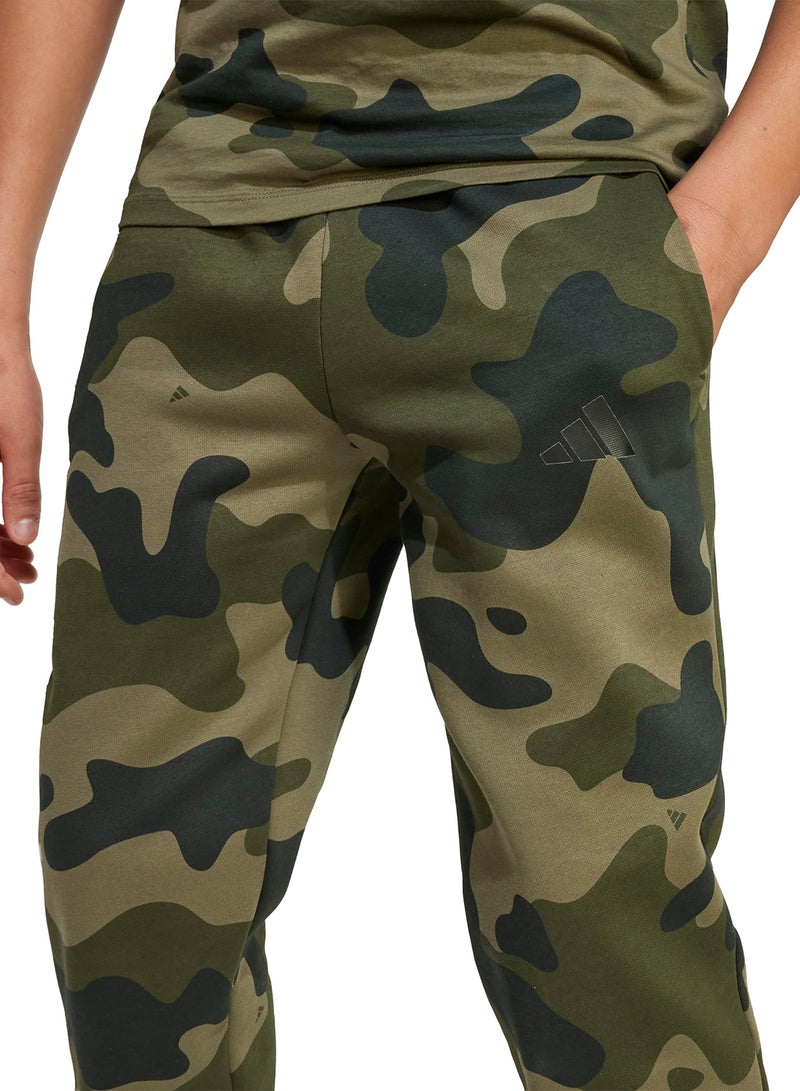 adidas بنطلون صوف أساسي موسمي مموه للشباب - Image 3