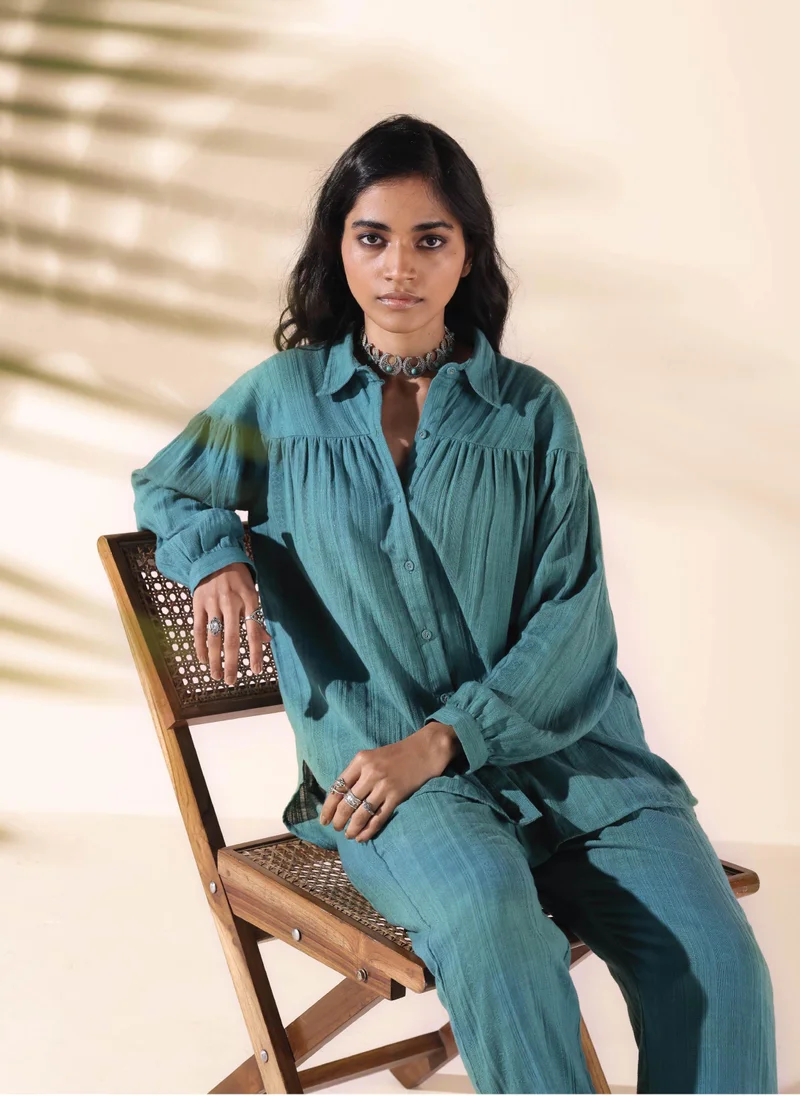 ترو برونز طقم قميص وسروال قطني أزرق فيروزي من