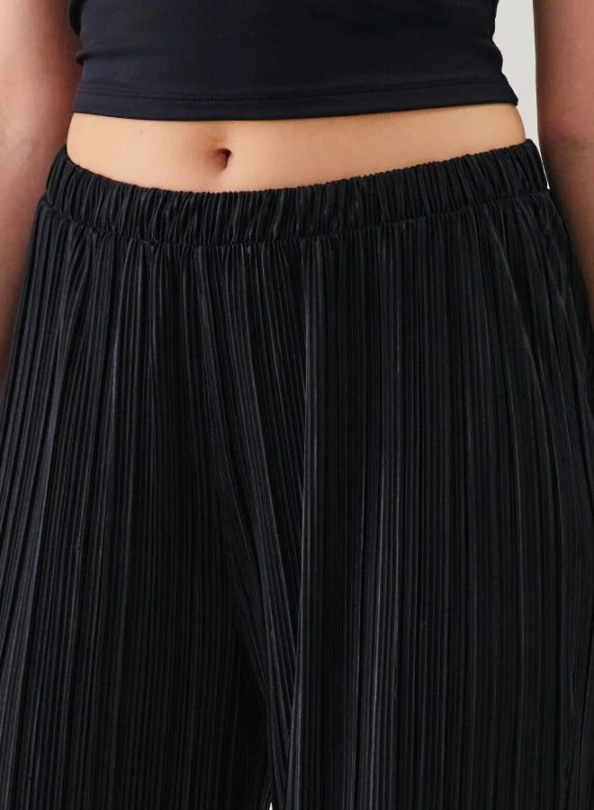 UNDIZ Pleated wide-leg trousers Black