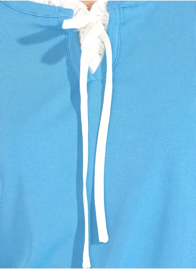 Styli Solid Knit Top with Long Sleeves & Tie Up Neck