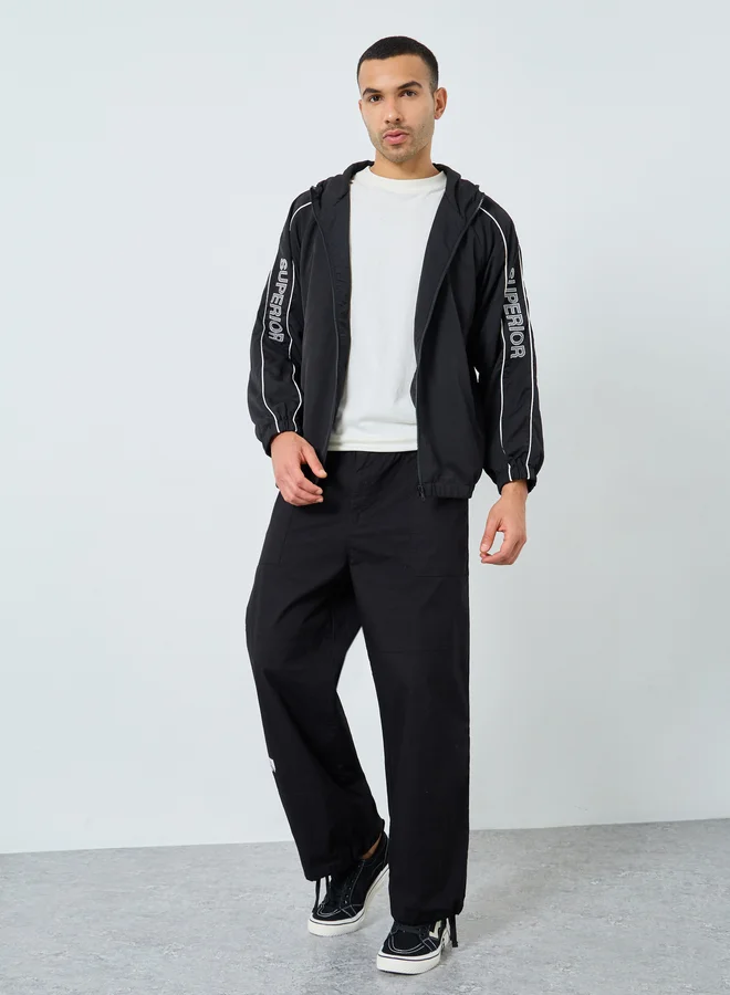 Styli Styli Men Black Oversized Superior Print Windbreaker Jacket