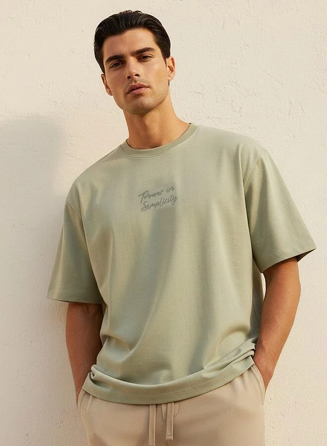 ايكونيك Iconic Men Regular Fit Crew Neck Short Sleeves Slogan Print T shirt