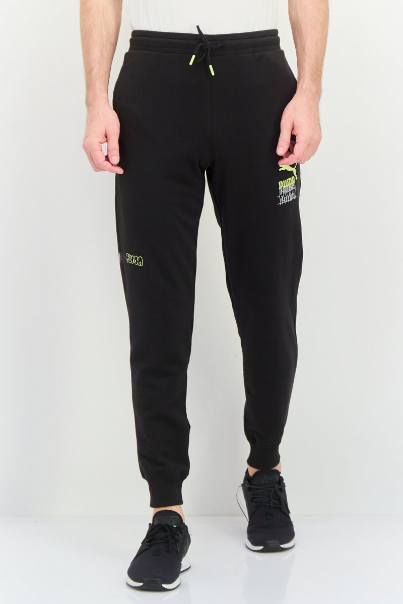 PUMA Men Sportswear Fit Outdoor Sweatpants, Black  - Image 1