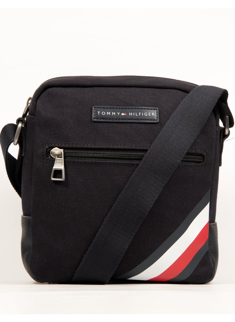 "Elevate Your Everyday Style with the Iconic Tommy Hilfiger Crossbody Bag: A Perfect Blend of Functionality and Fashion for Every Adventure, Featuring Timeless Design and Versatile Comfort!"