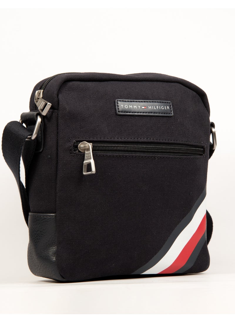 "Elevate Your Everyday Style with the Iconic Tommy Hilfiger Crossbody Bag: A Perfect Blend of Functionality and Fashion for Every Adventure, Featuring Timeless Design and Versatile Comfort!"
