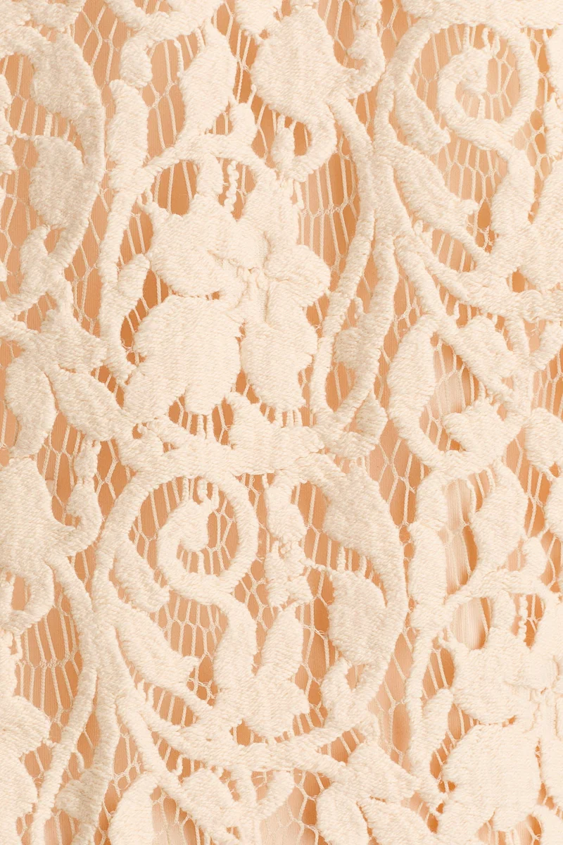 اتش اند ام بلوزة بيبلوم بنمط الكروشيه