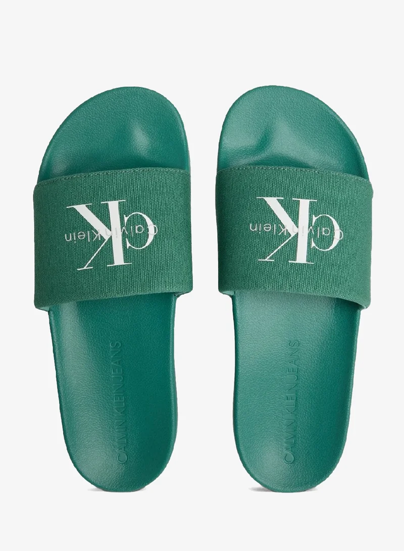 Calvin Klein Jeans Wild Green Canvas Logo Slides for Men | Best Price UAE