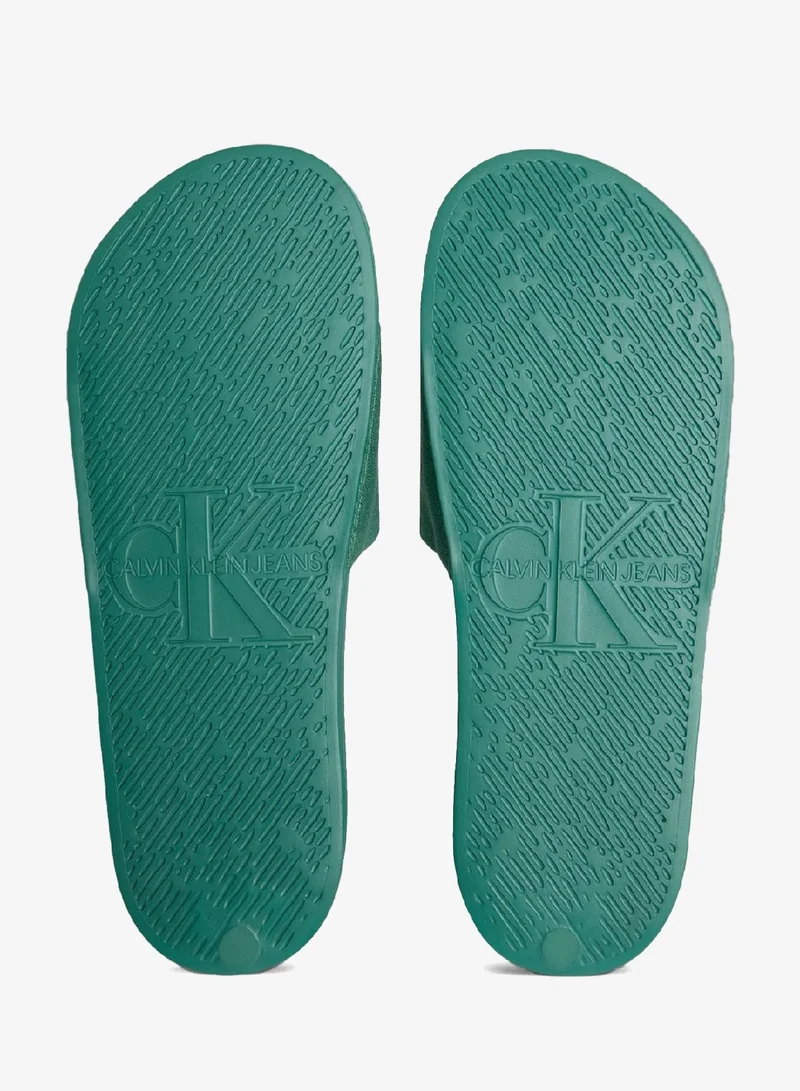 Calvin Klein Jeans Wild Green Canvas Logo Slides for Men | Best Price UAE
