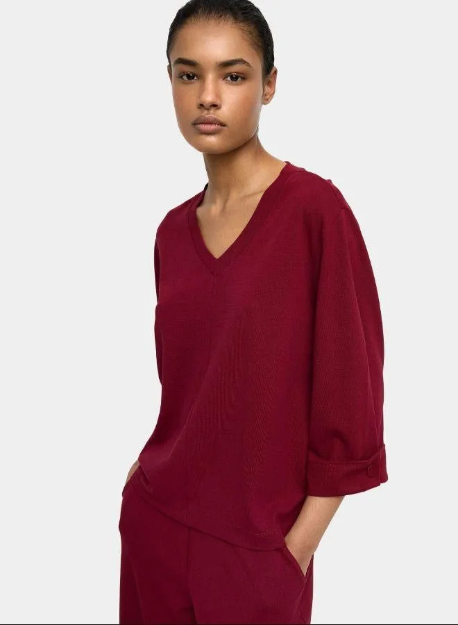 بارفوا الجزء العلوي مع رقبة على شكل حرف V