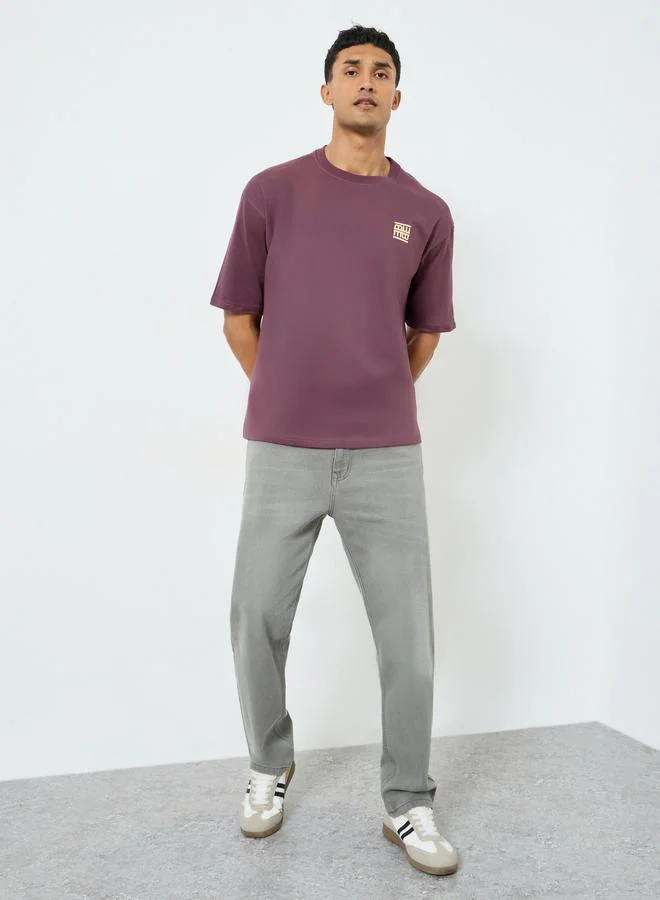 Styli Men Purple Graphic Print Oversized T-Shirt