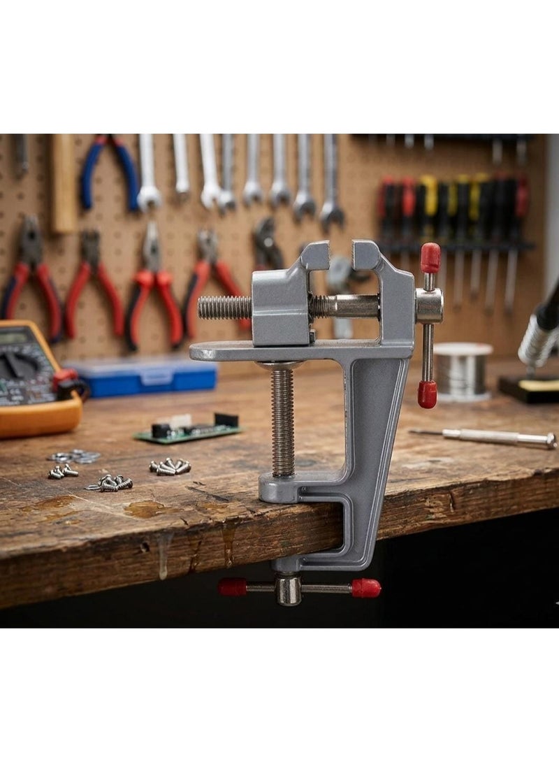 Portable table vise made of cast aluminum - a small rotating vise for precision work, crafts, and electronics.
