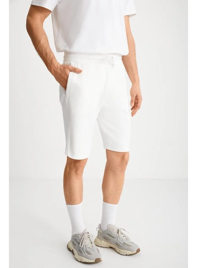 Grimelange Men's Beige Pocket Zipper Elastic Waist Shorts & Bermuda.