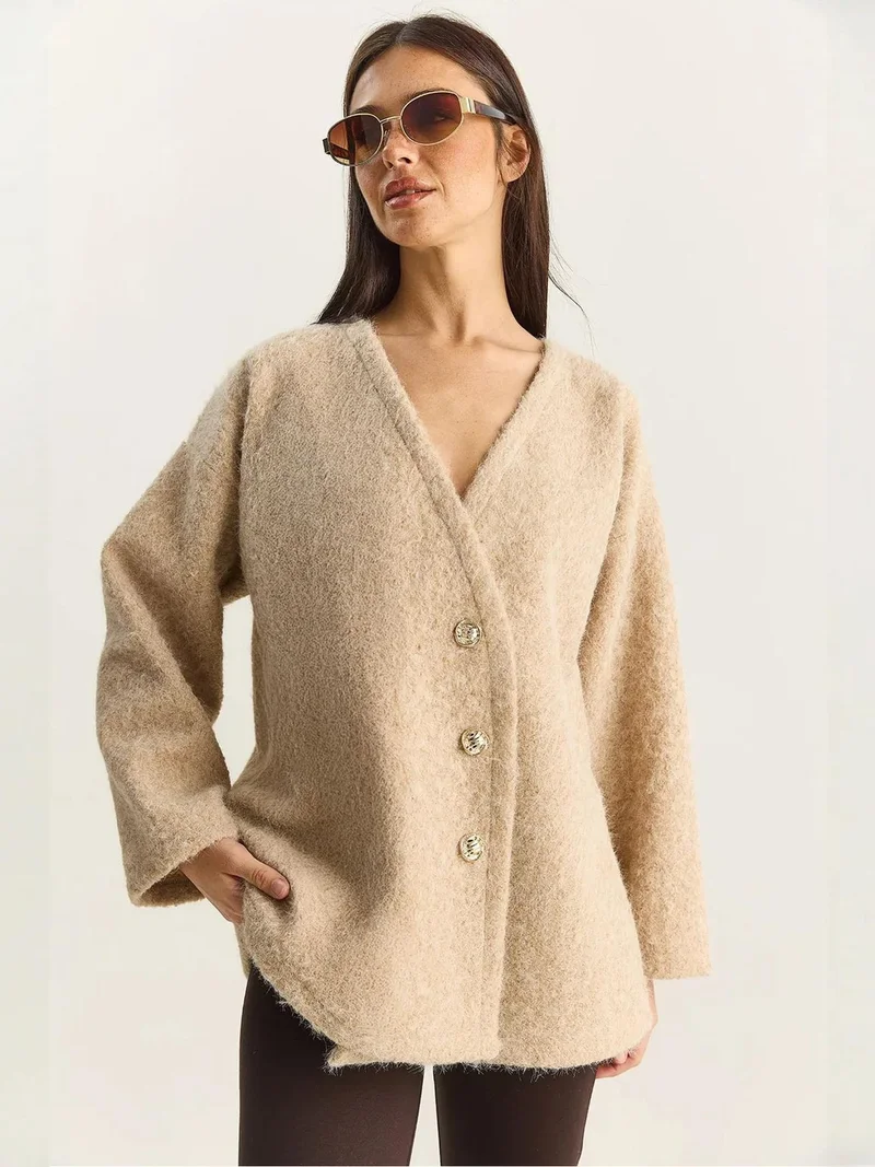 بيانكو لوتشي كارديجان بأزرار وياقة على شكل حرف  بنقشة لوتشي