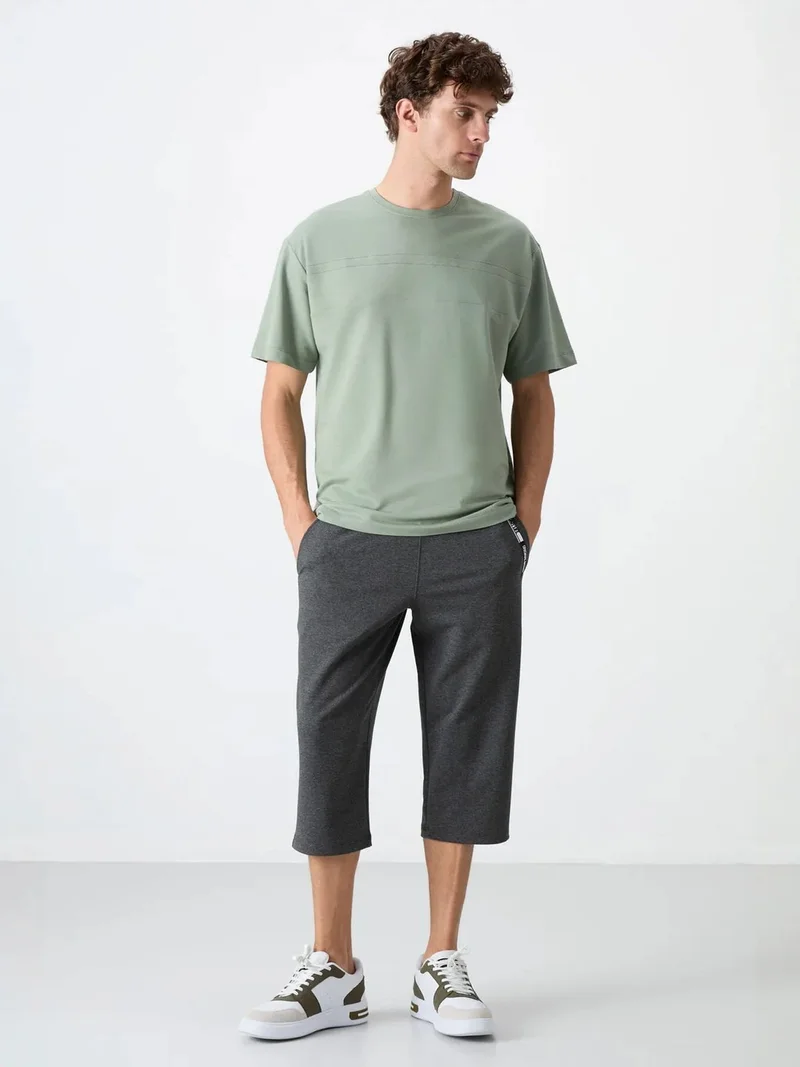 تومي لايف TOMMY Men's Mid-Waist Capri Shorts