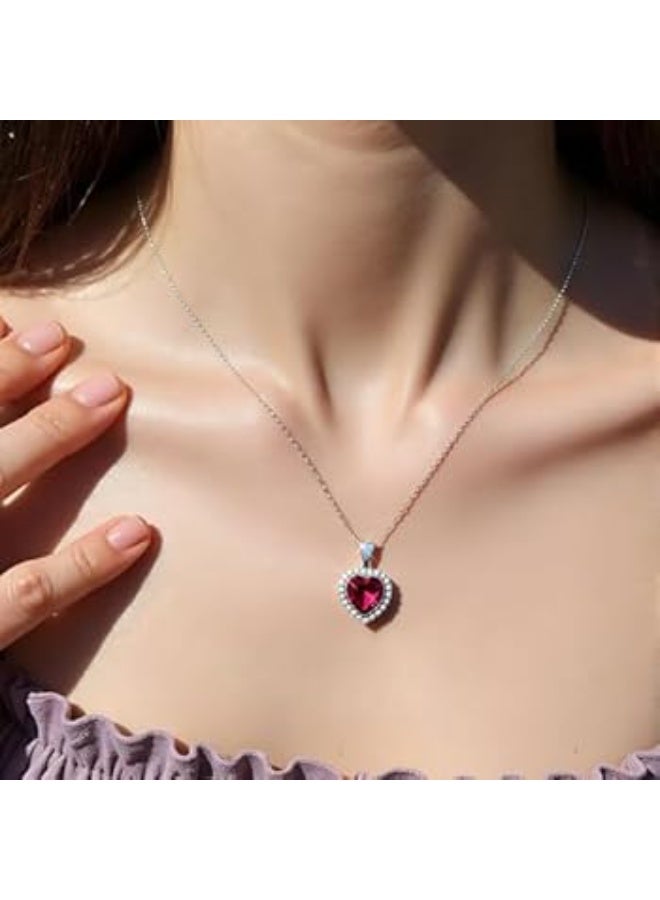 Luxuria A heart-shaped pendant set with a red ruby ​​and surrounded by a halo of clear stones. The pendant boasts a classic and romantic design, crafted from silver-plated stainless steel, and features cubic zirconia and synthetic rubies. - Image 3