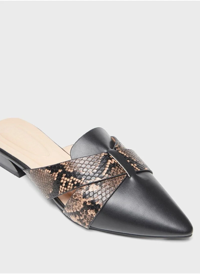 Celeste Pointed Toe Slip Ons