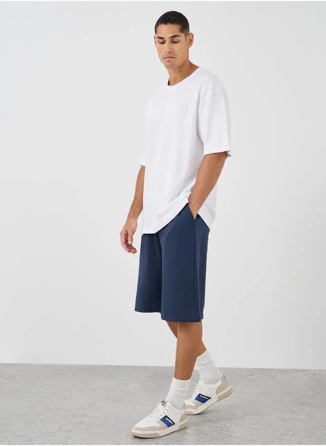 ستايلي Styli Oversized Solid Shorts with Drawstring