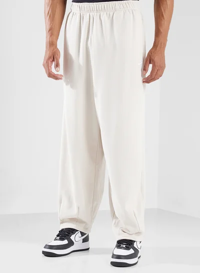 Nike Club Fitted Oversized Sweatpants