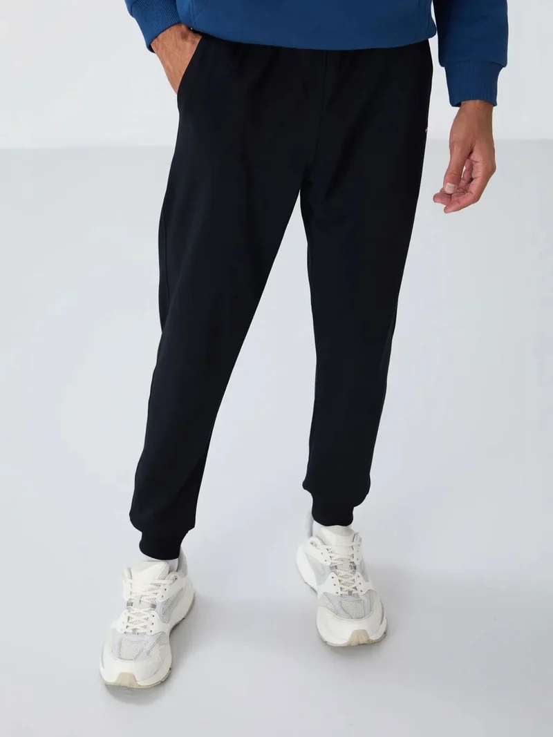 تومي لايف TOMMY Men's Solid Fleece Sweatpants
