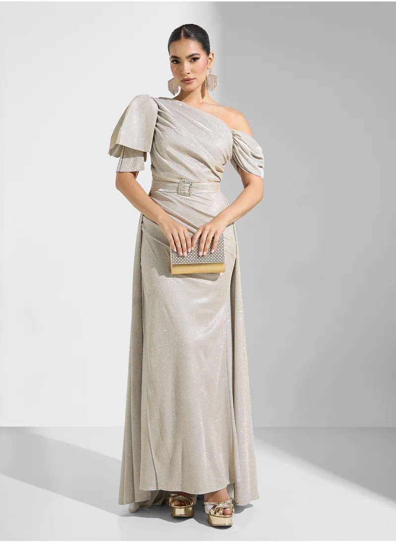 Namshi x Asymmetric Neck Shimmer Dress With Belt