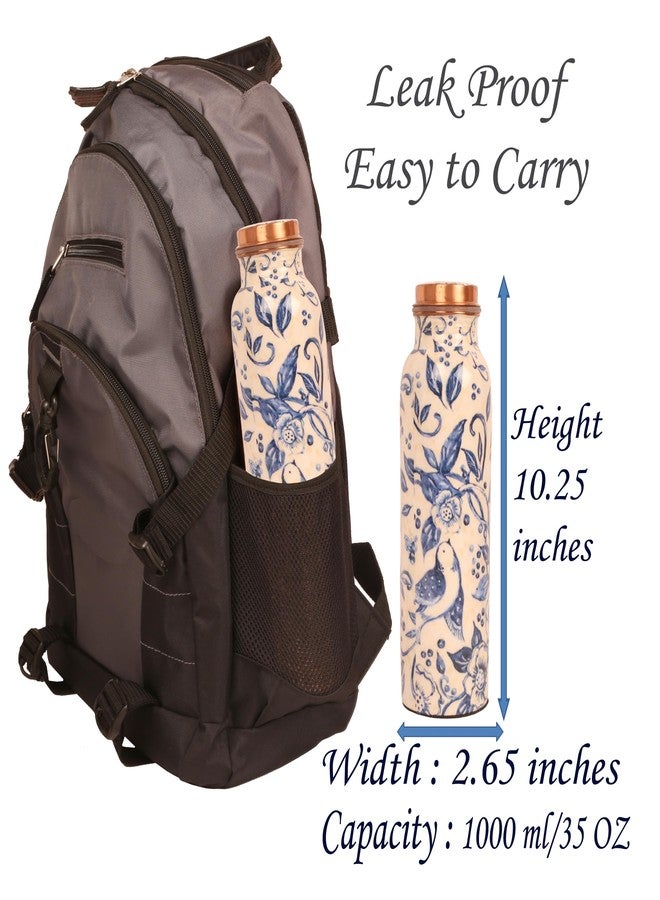 Indtresor Pure Copper Water Bottle - Handcrafted - Ayurveda health benefits - Large 1000 ml - Leak proof, Easy to carry for Sports, Fitness, Yoga, School- White Base Indigo Blue Floral Textured Enamel - Image 4