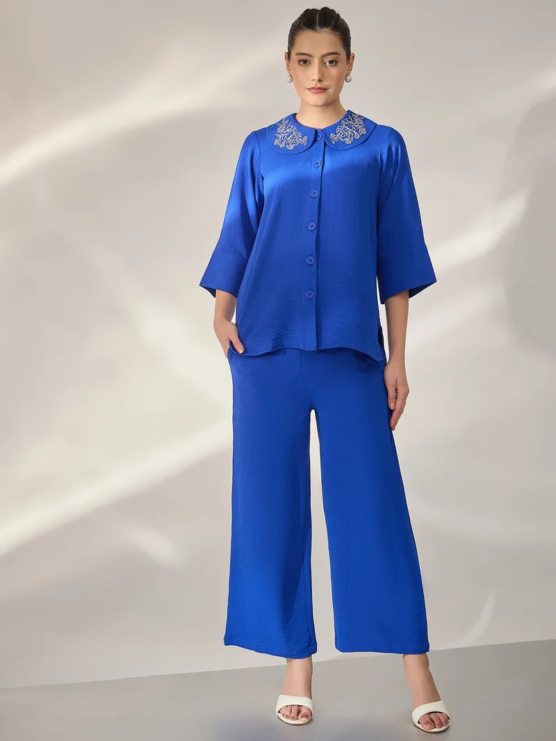 بانيت طقم متناسق (Co-ord Set) قميص مطرَّز بياقة بيتر بان مع بنطلون - أزرق