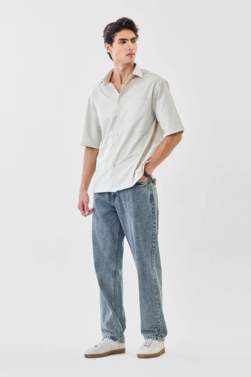 سنيتش قميص فضفاض بنقوش